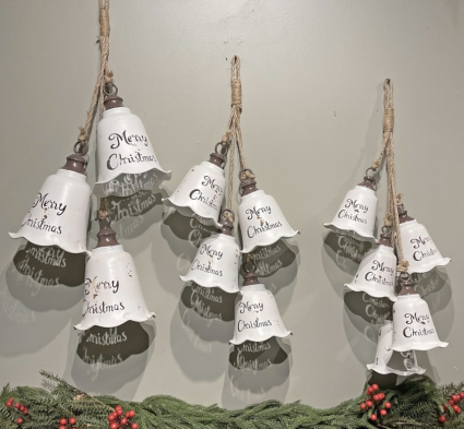 Three Large Hanging White Metal Bells