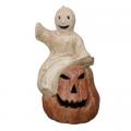 Happy Ghost Sitting on Top of a Smiling Pumpkin