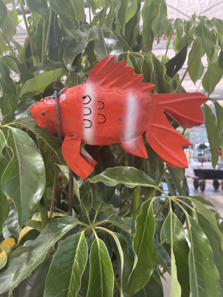 Red & White Fish on a Metal Stake