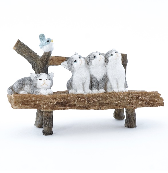Curious Kittens on Bench