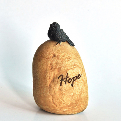 Fairy Garden Black Bird Sitting on a Stone that says Hope