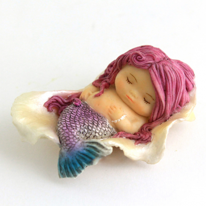 Little Fairy Mermaid Sleeping in Seashell