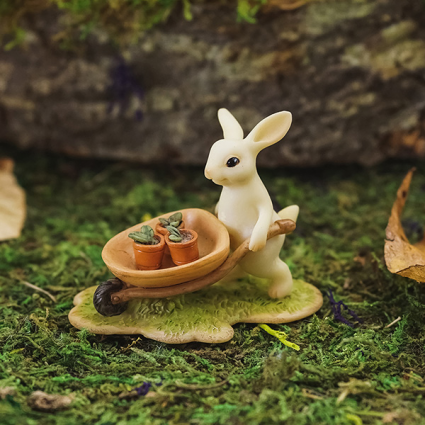 BUNNY GARDENER PUSHING WHEELBARR