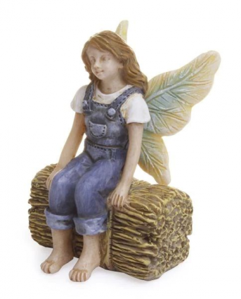 FAIRY, SITTING ON HAYSTACK